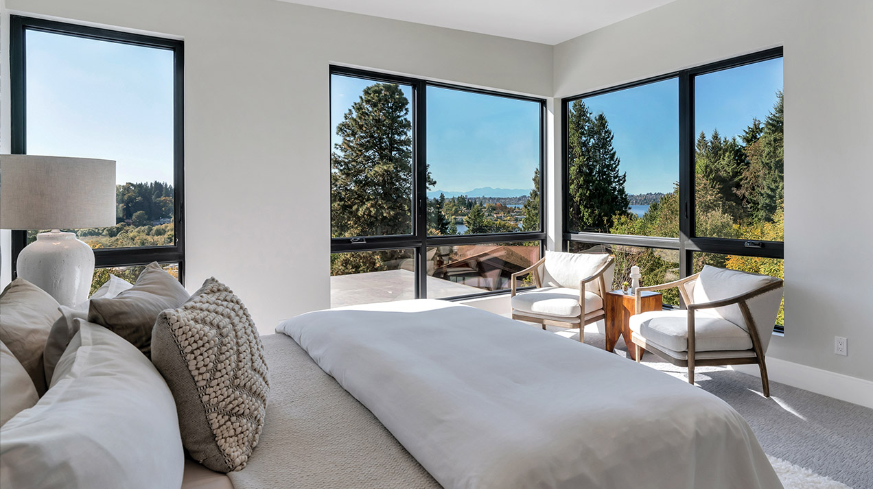 Bedroom with large beautiful windows